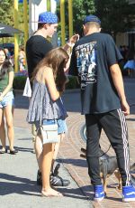 MADELAINE PETSCH and Travis Mills Walks Their Dogs at The Grove in Hollywood 09/09/2017