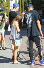 MADELAINE PETSCH and Travis Mills Walks Their Dogs at The Grove in Hollywood 09/09/2017