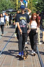 MADELAINE PETSCH and Travis Mills Walks Their Dogs at The Grove in Hollywood 09/09/2017
