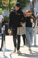 MADELAINE POETSCH and Travis Mills Out at The Grove in Los Angeles 09/23/2017