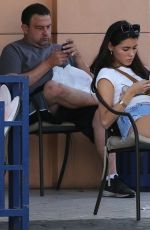 MADISON BEER in Denim Shorts at a Car Wash in Los Angeles 09/26/2017