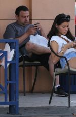 MADISON BEER in Denim Shorts at a Car Wash in Los Angeles 09/26/2017