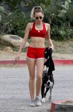MILEY CYRUS Walks Her Dog Out in Los Angeles 09/08/2017