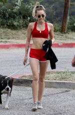 MILEY CYRUS Walks Her Dog Out in Los Angeles 09/08/2017