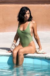 MONTIA SABBAG in Swimsuit at a Pool in Los Angeles 09/22/2017