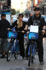 PARIS HILTON and Chris Zylka Riding Bicycles Out in New York 09/17/2017