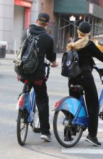 PARIS HILTON and Chris Zylka Riding Bicycles Out in New York 09/17/2017