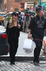 PARIS HILTON and Chris Zylka Riding Bicycles Out in New York 09/17/2017