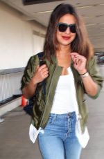 PRIYANKA CHOPRA in Ripped Jeans at LAX Airport 09/25/2017