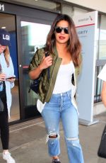 PRIYANKA CHOPRA in Ripped Jeans at LAX Airport 09/25/2017