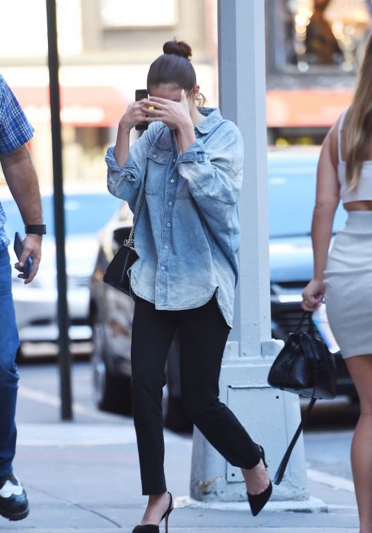 SELENA GOMEZ in Oversized Denim Shirt Out in New York 09/27/2017