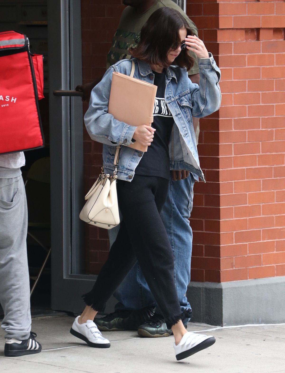 SELENA GOMEZ Leaves Her Apartment in New York 09/18/2017.