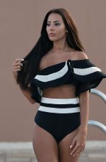 YAZMIN OUKHELLOU in Swimsuit at a Pool in Marbella 09/13/2017