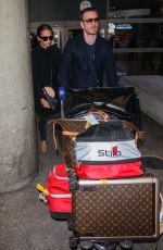 ALICIA VIKANDER and Michael Fassbender at LAX Airport in Los Angeles 10/04/2017