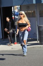 ANGELIQUE MORGAN in Ripped Jeans Shopping in Beverly Hills 10/27/2017