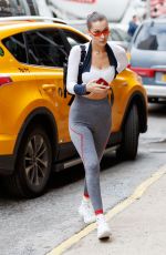 BELLA HADID in Tights Getting Out of a Cab in New York 10/12/2017