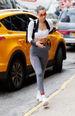 BELLA HADID in Tights Getting Out of a Cab in New York 10/12/2017