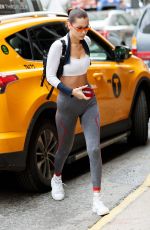 BELLA HADID in Tights Getting Out of a Cab in New York 10/12/2017
