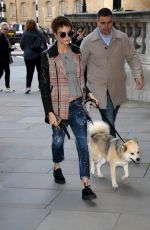 CARA DELEVINGNE with Her Dog Arrives at Hotel in London 10/05/2017