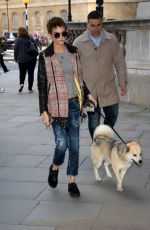 CARA DELEVINGNE with Her Dog Arrives at Hotel in London 10/05/2017