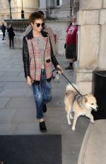 CARA DELEVINGNE with Her Dog Arrives at Hotel in London 10/05/2017