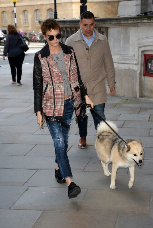 CARA DELEVINGNE with Her Dog Arrives at Hotel in London 10/05/2017