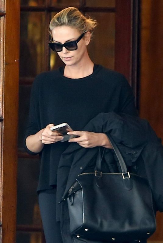 CHARLIZE THERON Leaves Her Hotel in Montreal 10/23/2017
