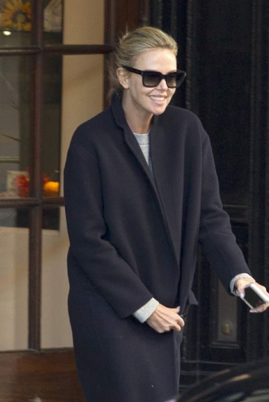CHARLIZE THERON Leaves Her Hotel in Montreal 10/26/2017