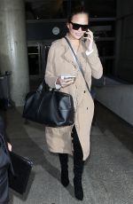 CHRISSY TEIGEN at LAX Airport in Los Angeles 10/06/2017