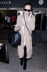 CHRISSY TEIGEN at LAX Airport in Los Angeles 10/06/2017
