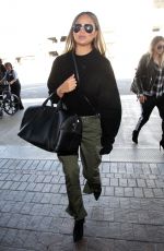 CHRISSY TEIGEN at Los Angeles International Airport 10/02/2017