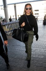 CHRISSY TEIGEN at Los Angeles International Airport 10/02/2017