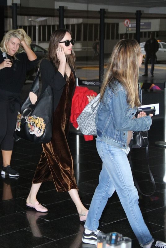 DAKOTA JOHNSON and JENNIFER MEYER at Tom Jobim International Airport in Rio De Janeiro 10/23/2017