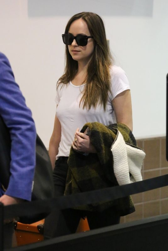 DAKOTA JOHNSON at LAX Airport in Los Angeles 10/28/2017