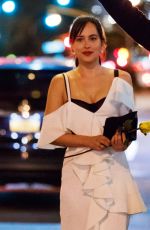 DAKOTA JOHNSON Catches a Cab in New York 10/03/2017