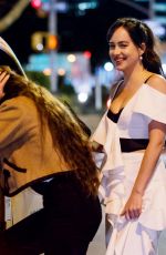 DAKOTA JOHNSON Catches a Cab in New York 10/03/2017