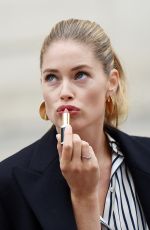 DOUTZEN KROES on the Set of a Photoshoot at Arc De Triomphe in Paris 10/01/2017