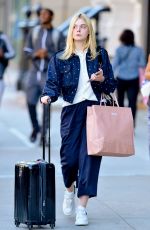 ELLE FANNING Arrives Back in New York 10/04/2017