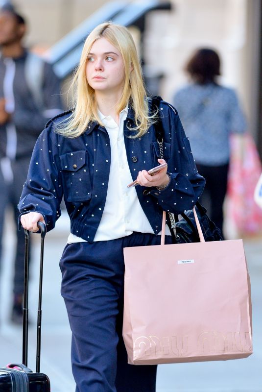 ELLE FANNING Arrives Back in New York 10/04/2017