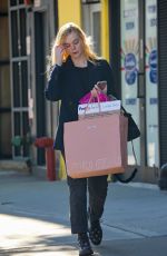 ELLE FANNING Out Shopping in New York 10/17/2017
