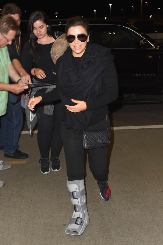 EVA LONGORIA with Support Boot on Her Broken Ankle at LAX Airport 10/26/2017