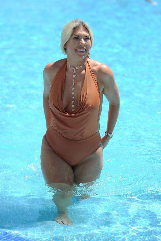 FRANKIE ESSEX in Swimsuit at a Pool in Marbella 10/09/2017