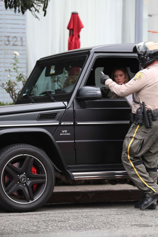 HILARY DUFF Receives a Parking Ticket Out in Los Angeles 10/30/2017