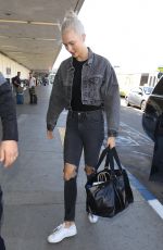 KARLIE KLOSS in Dark Denim at LAX Airport in Los Angeles 10/15/2017