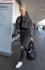 KARLIE KLOSS in Dark Denim at LAX Airport in Los Angeles 10/15/2017