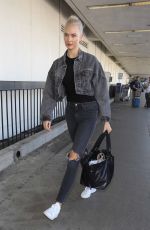 KARLIE KLOSS in Dark Denim at LAX Airport in Los Angeles 10/15/2017