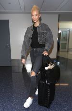KARLIE KLOSS in Dark Denim at LAX Airport in Los Angeles 10/15/2017