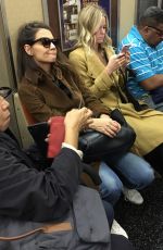 KATIE HOLMES Rides a R Train in New York 10/13/2017