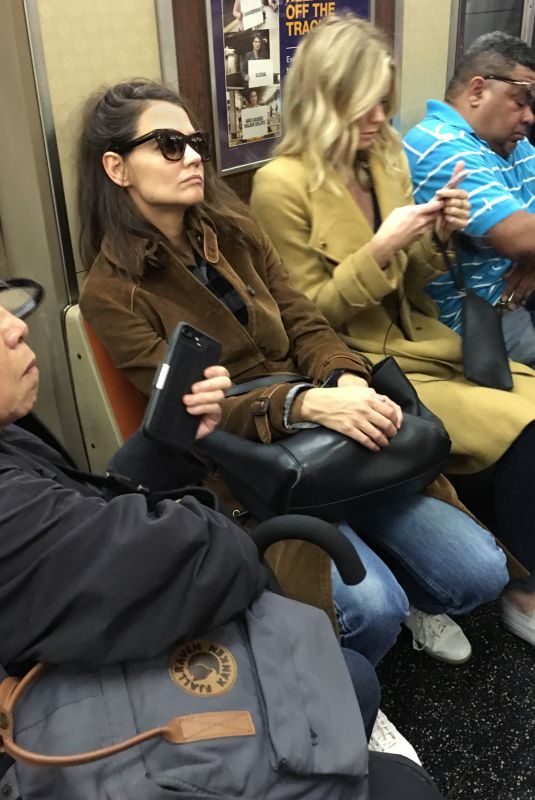 KATIE HOLMES Rides a R Train in New York 10/13/2017