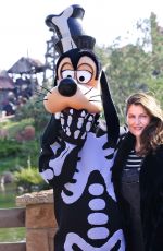 LAETITIA CASTA Poses with Goofy at Disneyland Paris in Marne La Vallee 09/28/2017